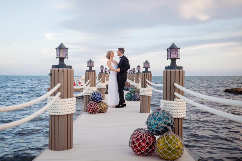 newlywed couple on the dock